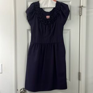 Side zip mid thigh dress. Rich purple color.